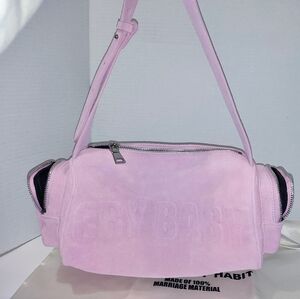 Suade "CRYBABY" Logo On Front Of Bag.